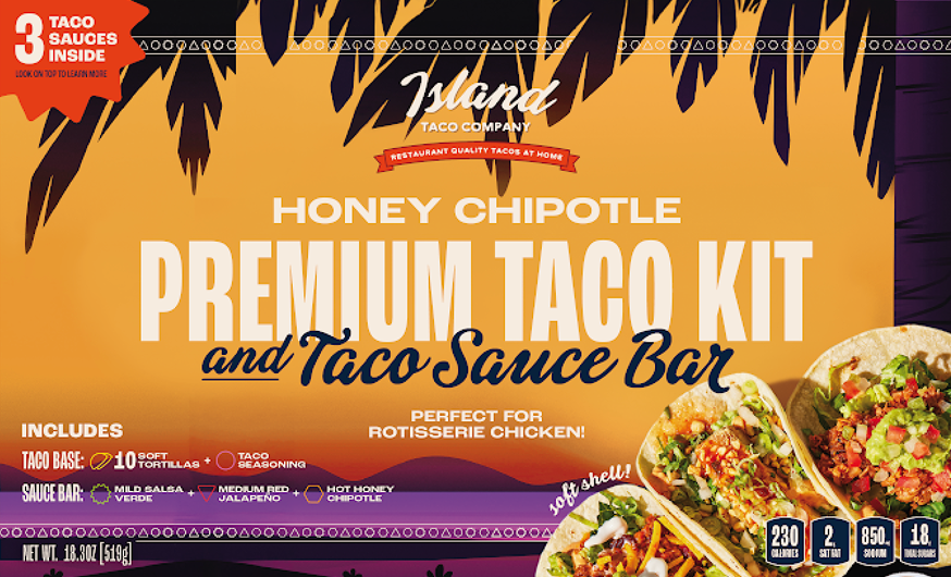 Front packaging of the Island Taco Company Honey Chipotle Premium Taco Kit and Taco Sauce Bar, featuring a bright orange and purple design with black palm leaves and photos of filled tacos.
